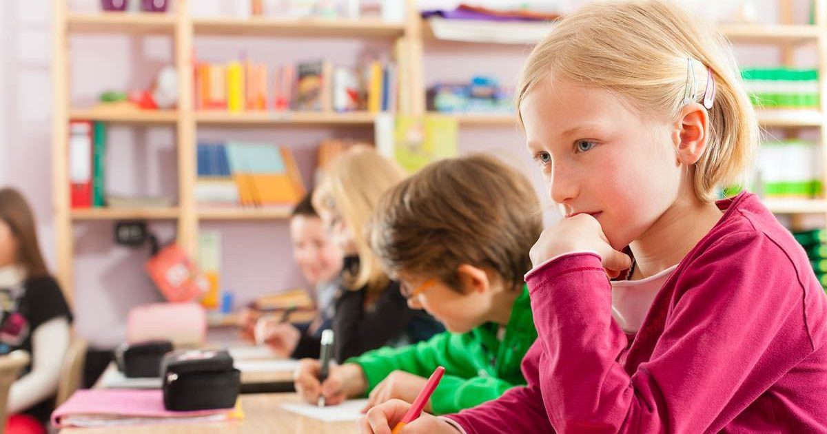 a group of children in a classroom